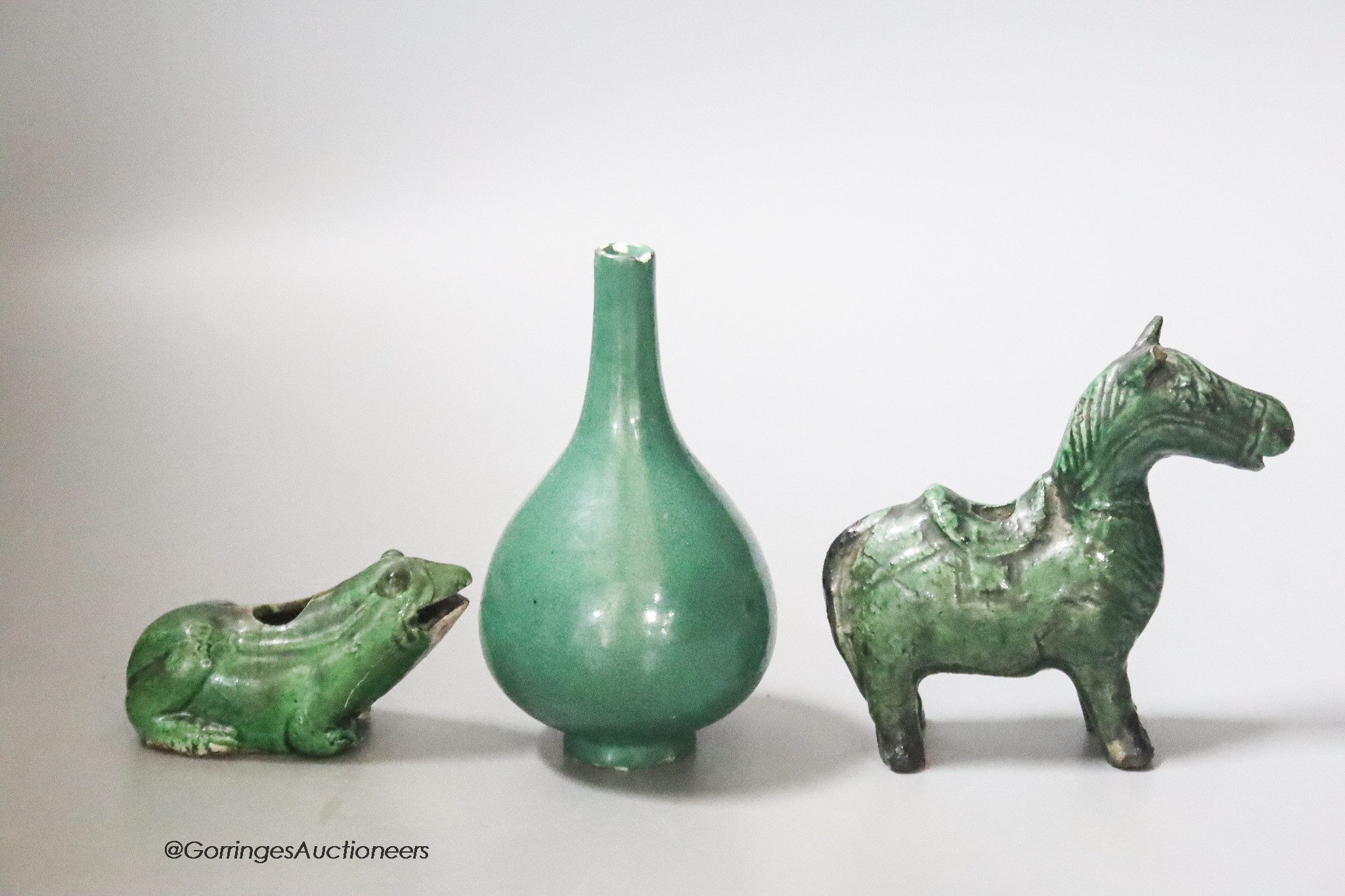 A Chinese green glazed miniature vase, 10cm, two green glazed water droppers in the form of a horse and a frog